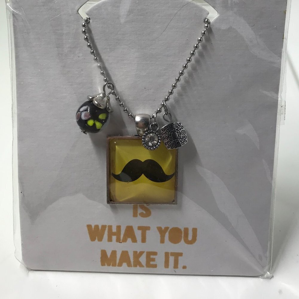 NEW Pendent Necklace with a mustache pendent and 3 charms on a 18 inch chain